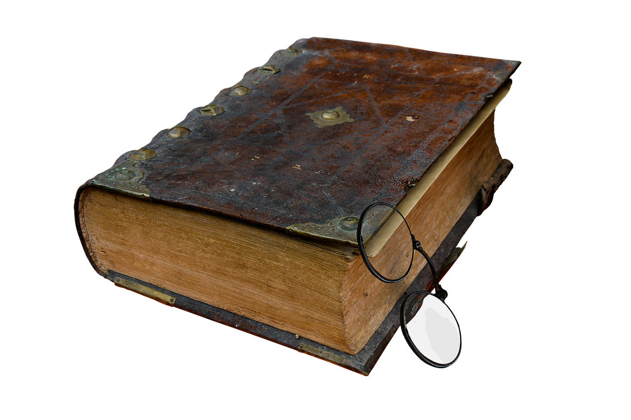A closed ancient tome with ornate details.